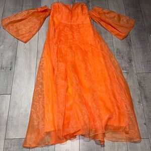 Orange pleated dress